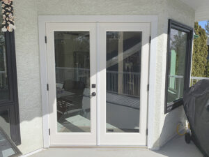 Patio door replacement on a home in West Kelowna by Adera Windows & Doors