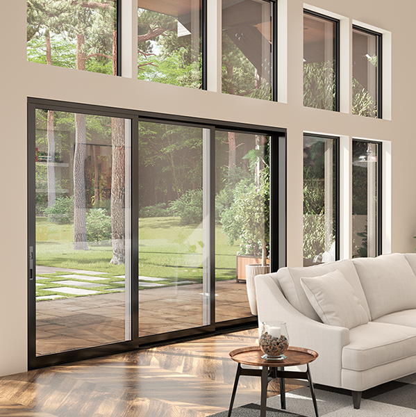 Modern multi-slide stacking glass doors fully open to connect a spacious indoor living area with an outdoor patio, showcasing a wide opening and seamless indoor-outdoor flow.